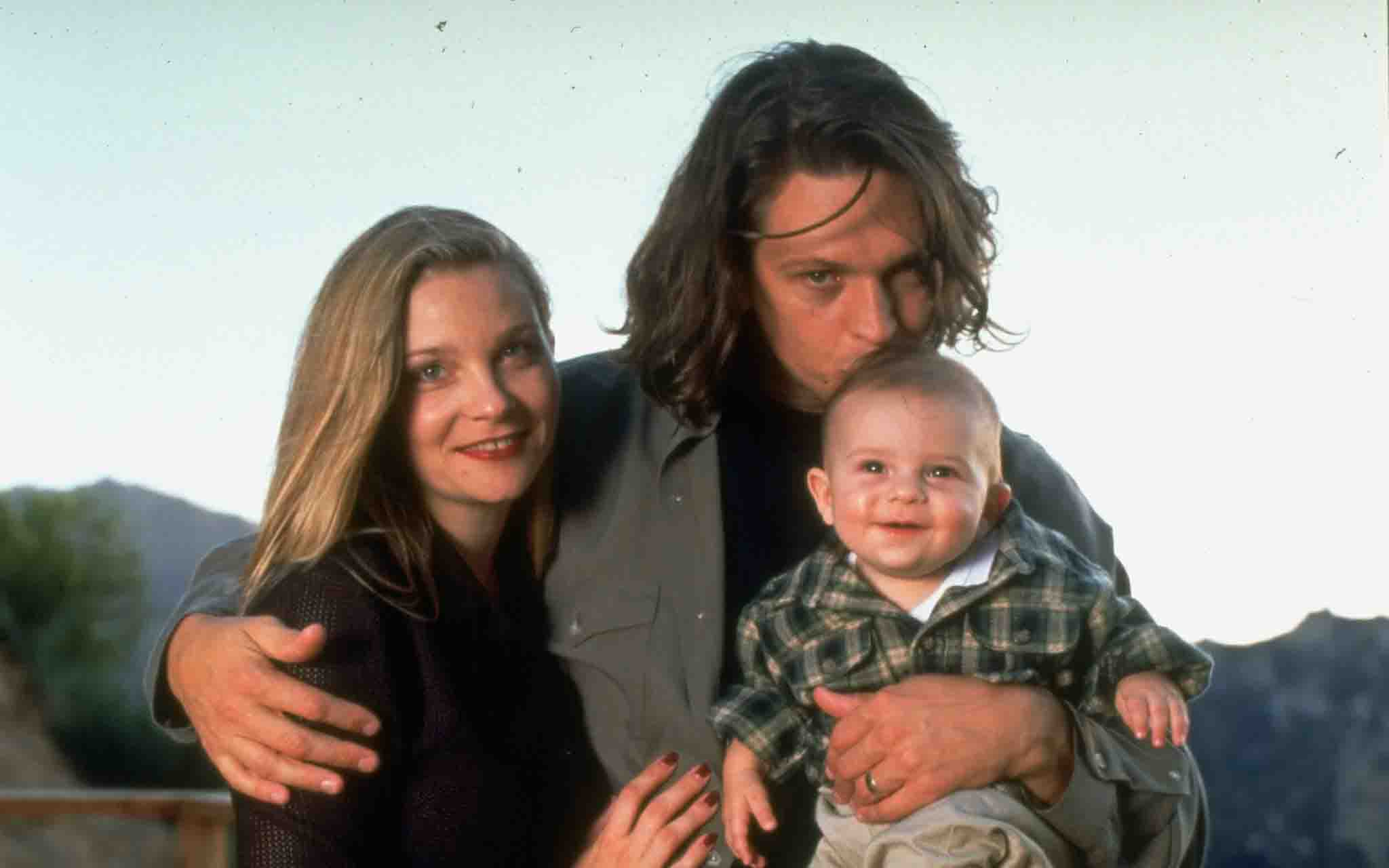 Jimmy McNichol with his wife and son.